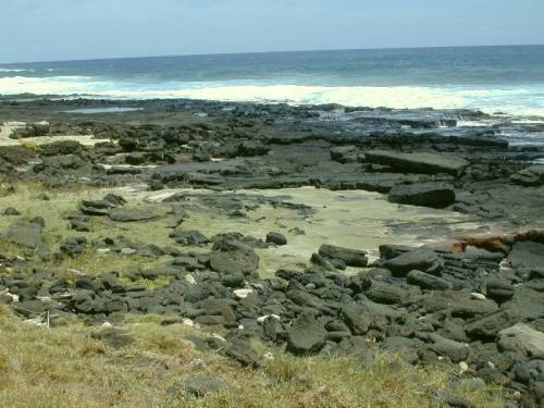 Зеленый песок пляжа Papakolea Beach, Большой остров, Гавайи (США)